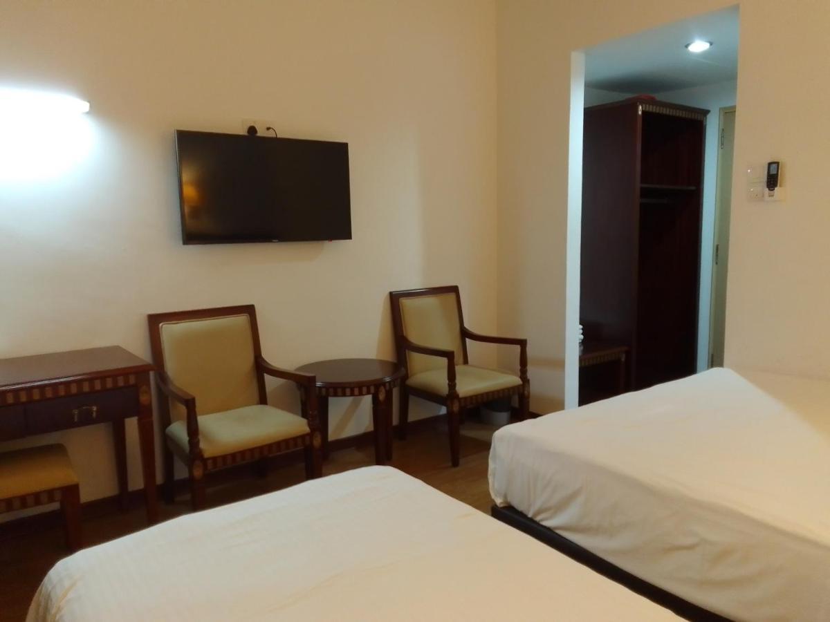 Super Oyo 90464 Borneo Suites Hotel Кота-Кинабалу Экстерьер фото
