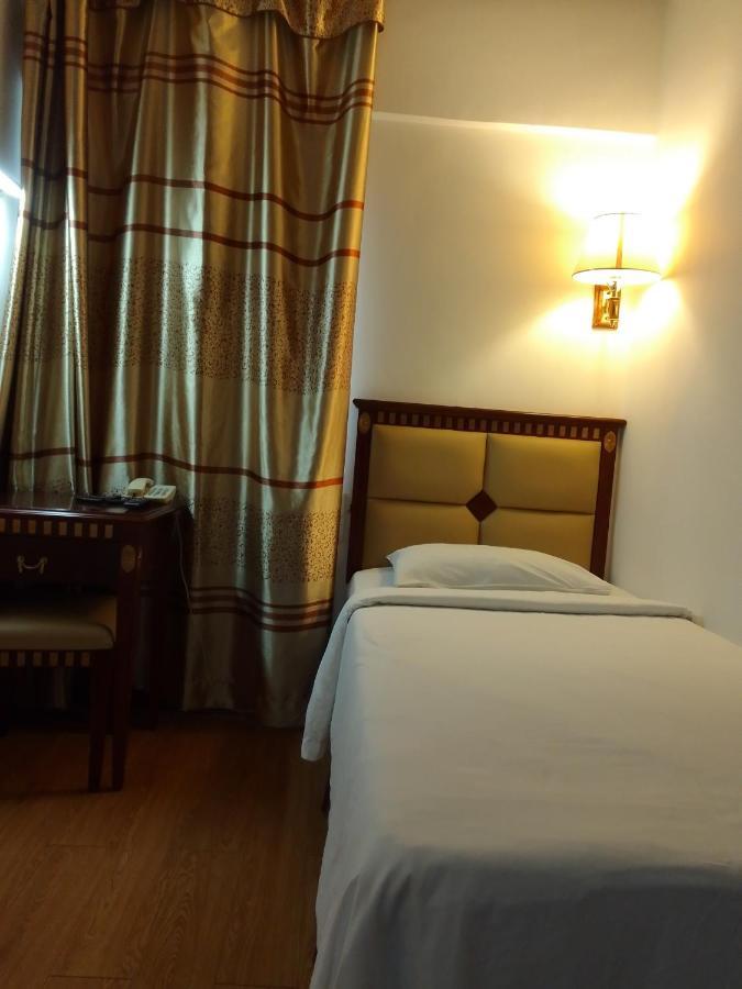 Super Oyo 90464 Borneo Suites Hotel Кота-Кинабалу Экстерьер фото