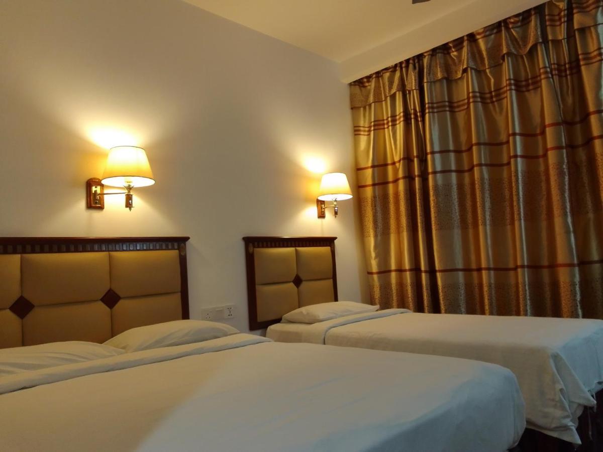 Super Oyo 90464 Borneo Suites Hotel Кота-Кинабалу Экстерьер фото
