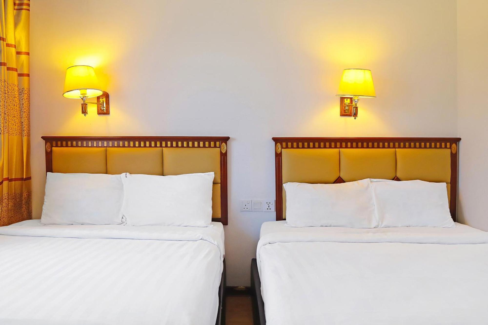 Super Oyo 90464 Borneo Suites Hotel Кота-Кинабалу Экстерьер фото